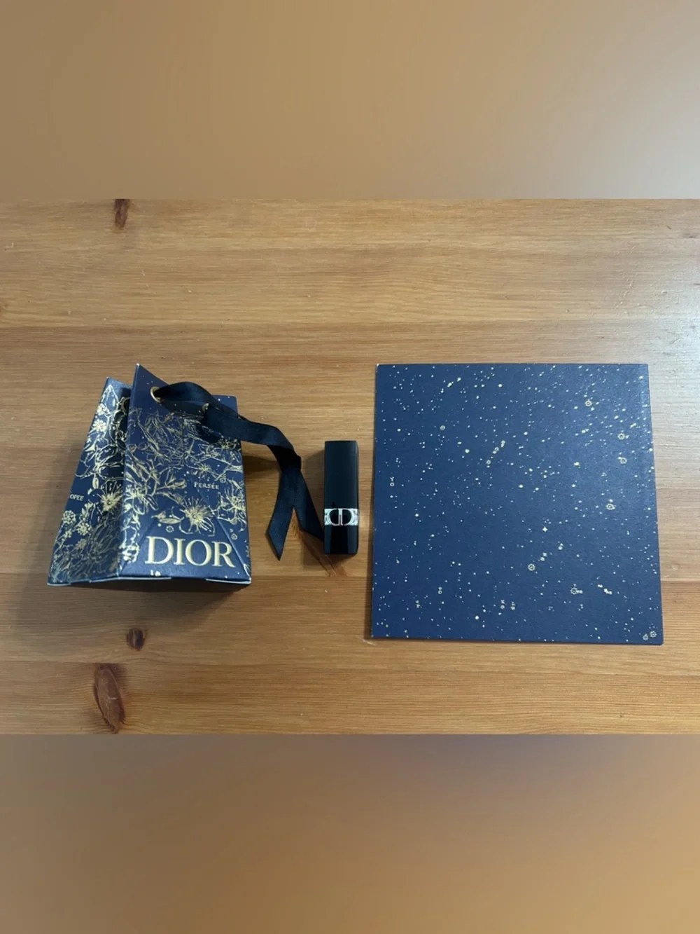 Dior rouge mini lipstick in SATIN 999 (red) with matching bauble and card